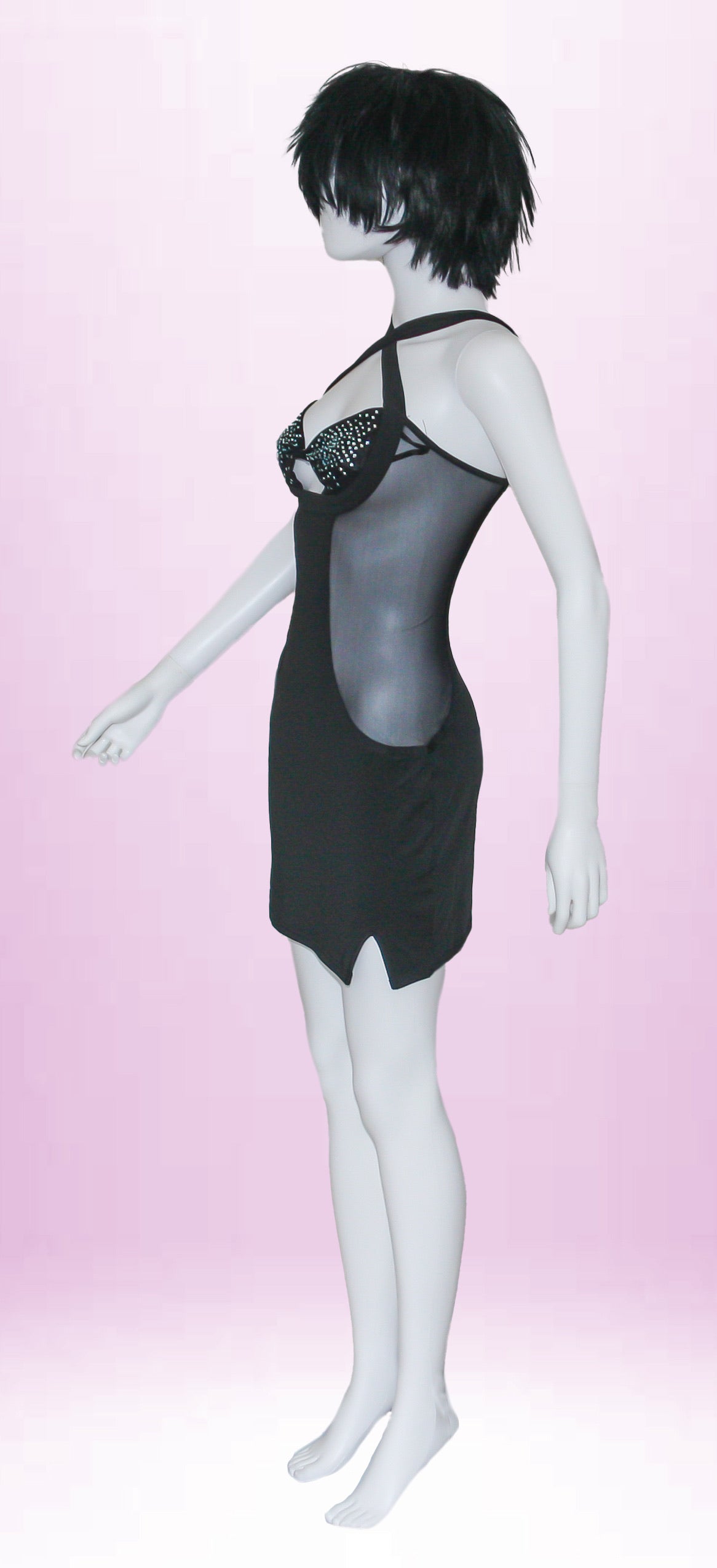 Abito corto sexy aderente nero con trasparenze e pajettes