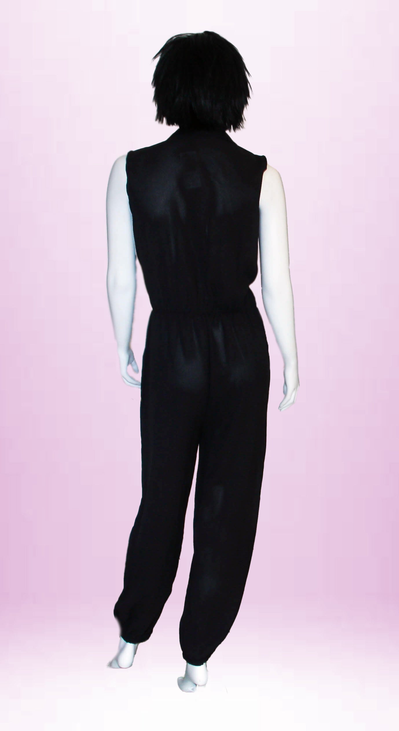 Abito a tuta nero con tasche frontali colletto e bottoni